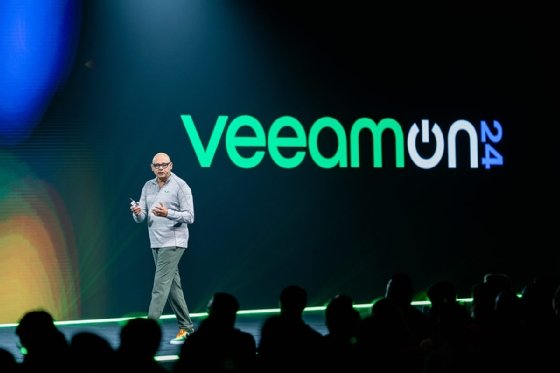 Veeam CEO Anand Eswaran speaking on stage at the VeeamON 2024 conference.