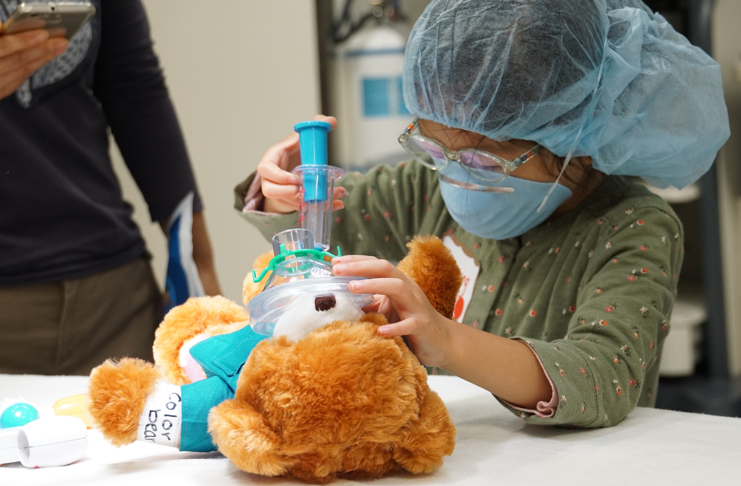 Children use medical play props to become more familiar with the treatment they will receive.